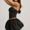 Mini gonna a vita media con orlo a palloncino Clemmy in nero Mini gonna a vita media con orlo a palloncino Clemmy in nero