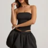 Mini gonna a vita media con orlo a palloncino Clemmy in nero Mini gonna a vita media con orlo a palloncino Clemmy in nero