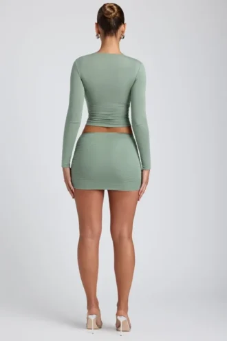 Mini gonna a vita media con ruches in modal Cali, verde salvia