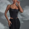 Mini gonna con allacciatura Asra in nero Mini gonna con allacciatura Asra in nero