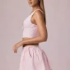 Mini gonna con coulisse e arricciature Maira a righe color malva chiaro Mini gonna con coulisse e arricciature Maira a righe color malva chiaro