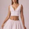 Mini gonna con coulisse e arricciature Maira a righe color malva chiaro Mini gonna con coulisse e arricciature Maira a righe color malva chiaro