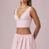 Mini gonna con coulisse e arricciature Maira a righe color malva chiaro Mini gonna con coulisse e arricciature Maira a righe color malva chiaro