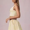 Mini gonna con coulisse e arricciature Maira a righe giallo limone Mini gonna con coulisse e arricciature Maira a righe giallo limone
