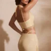 Mini gonna con dettagli sulle spalline decorati Roux in oro Mini gonna con dettagli sulle spalline decorati Roux in oro