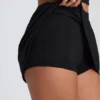 Mini gonna-pantaloncino A-line Solene in modal nero Mini gonna-pantaloncino A-line Solene in modal nero