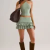 Mini gonna-pantaloncino a vita media con volant in modal Azaria, verde salvia Mini gonna-pantaloncino a vita media con volant in modal Azaria, verde salvia