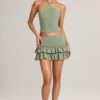 Mini gonna-pantaloncino a vita media con volant in modal Azaria, verde salvia Mini gonna-pantaloncino a vita media con volant in modal Azaria, verde salvia