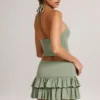 Mini gonna-pantaloncino a vita media con volant in modal Azaria, verde salvia Mini gonna-pantaloncino a vita media con volant in modal Azaria, verde salvia