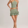 Mini gonna-pantaloncino a vita media con volant in modal Azaria, verde salvia Mini gonna-pantaloncino a vita media con volant in modal Azaria, verde salvia