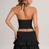Mini gonna-pantaloncino con volant in modal Azaria, nero Mini gonna-pantaloncino con volant in modal Azaria, nero
