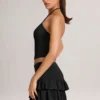 Mini gonna-pantaloncino con volant in modal Azaria, nero Mini gonna-pantaloncino con volant in modal Azaria, nero