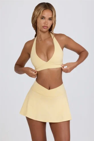 Mini gonna-pantaloncino incrociata in jersey spazzolato melange limone