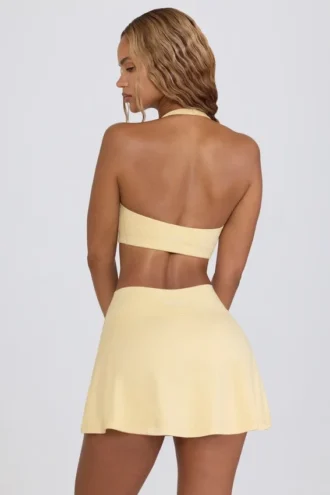 Mini gonna-pantaloncino incrociata in jersey spazzolato melange limone