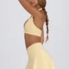 Mini gonna-pantaloncino incrociata in jersey spazzolato melange limone Mini gonna-pantaloncino incrociata in jersey spazzolato melange limone