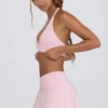 Mini gonna-pantaloncino incrociata in jersey spazzolato rosa pallido melange Mini gonna-pantaloncino incrociata in jersey spazzolato rosa pallido melange