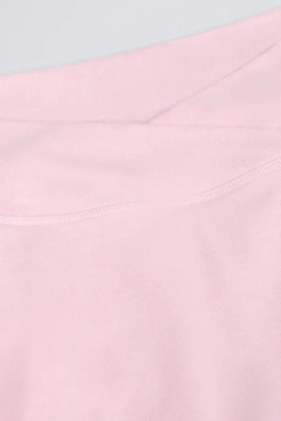 Mini gonna-pantaloncino incrociata in jersey spazzolato rosa pallido melange Mini gonna-pantaloncino incrociata in jersey spazzolato rosa pallido melange