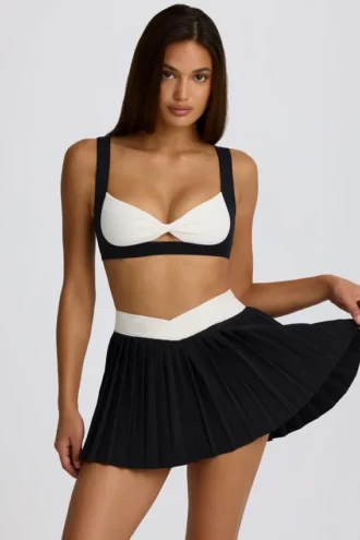 Mini gonna-pantaloncino plissettato Soft Active Crossover in nero Mini gonna-pantaloncino plissettato Soft Active Crossover in nero