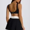 Mini gonna-pantaloncino plissettato Soft Active Crossover in nero