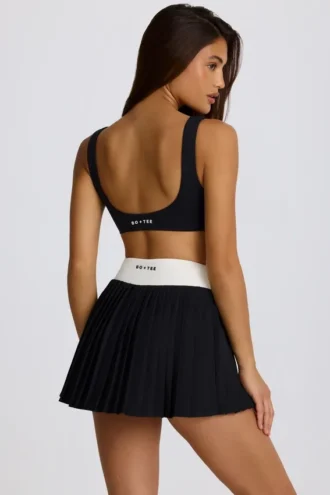 Mini gonna-pantaloncino plissettato Soft Active Crossover in nero Mini gonna-pantaloncino plissettato Soft Active Crossover in nero