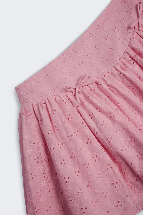 Mini gonna Thia con fiocco in broderie anglaise rosa tenue Mini gonna Thia con fiocco in broderie anglaise rosa tenue