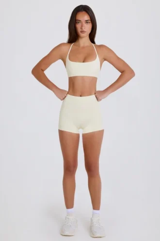 Mini shorts a vita alta color crema