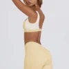 Mini shorts arricciati in melange limone Mini shorts arricciati in melange limone
