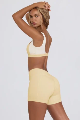Mini shorts arricciati in melange limone Mini shorts arricciati in melange limone