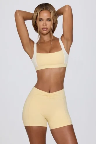 Mini shorts arricciati in melange limone Mini shorts arricciati in melange limone