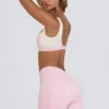 Mini shorts arricciati in melange rosa pallido Mini shorts arricciati in melange rosa pallido