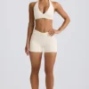 Mini shorts con ruches in avorio melange Mini shorts con ruches in avorio melange