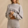Mini shorts in maglia a vita media in grigio ghiaccio melange Mini shorts in maglia a vita media in grigio ghiaccio melange