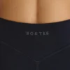 Mini shorts Soft Active con fascia incrociata in nero Mini shorts Soft Active con fascia incrociata in nero