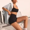 Mini shorts Soft Active con fascia incrociata in nero Mini shorts Soft Active con fascia incrociata in nero