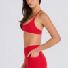 Mini shorts Soft Active con tasche e vita a V in rosso fragola Mini shorts Soft Active con tasche e vita a V in rosso fragola
