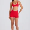 Mini shorts Soft Active con tasche e vita a V in rosso fragola Mini shorts Soft Active con tasche e vita a V in rosso fragola
