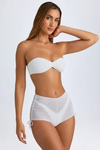 Mini shorts trasparenti con arricciature Rocas in bianco