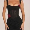 Miniabito con gonna drappeggiata e corsetto Miller in nero Miniabito con gonna drappeggiata e corsetto Miller in nero