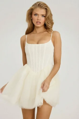 Miniabito con gonna in tulle e corsetto decorato Eugenie in bianco
