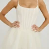 Miniabito con gonna in tulle e corsetto decorato Eugenie in bianco Miniabito con gonna in tulle e corsetto decorato Eugenie in bianco