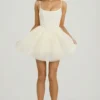 Miniabito con gonna in tulle e corsetto decorato Eugenie in bianco Miniabito con gonna in tulle e corsetto decorato Eugenie in bianco
