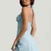 Nerine Abito mini svasato con scollo all’americana e stampa floreale blu