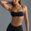 Oh Polly Costumi da Bagno: Top micro bikini decorato HOTFIX Edition in nero