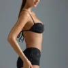 Oh Polly Costumi da Bagno: Top micro bikini decorato HOTFIX Edition in nero