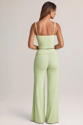 Pantaloni a gamba larga con risvolto in modal Melida, colore verde salvia