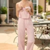Pantaloni a gamba larga in popeline di cotone Dalila a righe rosa e bianche Pantaloni a gamba larga in popeline di cotone Dalila a righe rosa e bianche