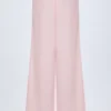 Pantaloni a gamba larga in popeline di cotone Dalila a righe rosa e bianche Pantaloni a gamba larga in popeline di cotone Dalila a righe rosa e bianche