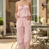 Pantaloni a gamba larga in popeline di cotone Dalila a righe rosa e bianche Pantaloni a gamba larga in popeline di cotone Dalila a righe rosa e bianche