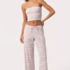 Pantaloni a vita bassa in jersey a costine a righe rosa Pantaloni a vita bassa in jersey a costine a righe rosa