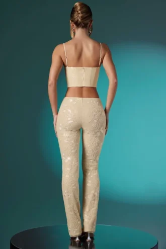 Pantaloni a vita bassa in pizzo decorato Fallon Petite in avorio